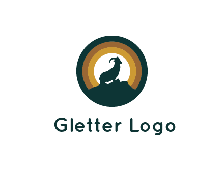 mountain goat silhouette standing on cliff in circle