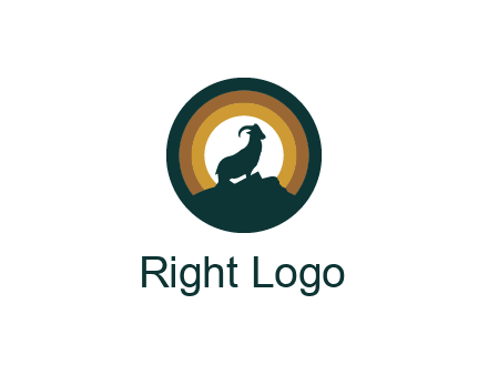 mountain goat silhouette standing on cliff in circle