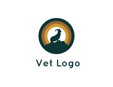 mountain goat silhouette standing on cliff in circle