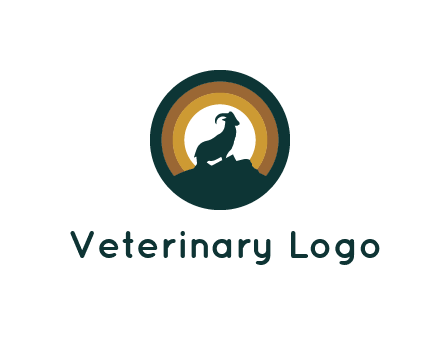 mountain goat silhouette standing on cliff in circle
