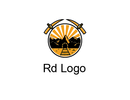 pickaxe behind circle with mountains and railroad