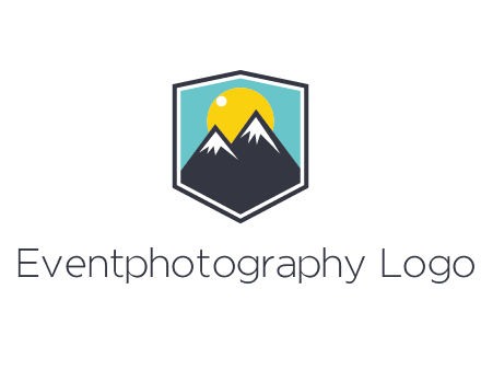 sun behind mountain in frame