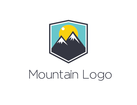 sun behind mountain in frame