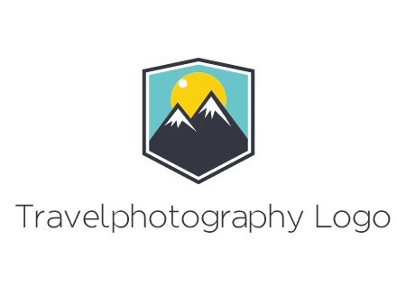 sun behind mountain in frame