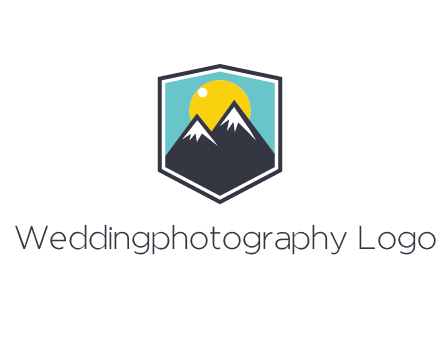 sun behind mountain in frame