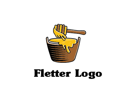 honey dipper with bucket of honey