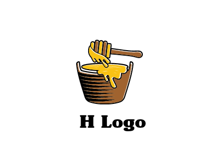 honey dipper with bucket of honey
