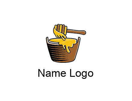honey dipper with bucket of honey