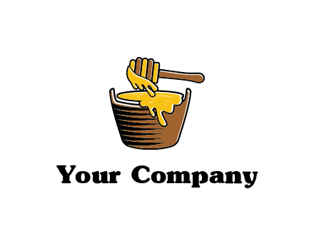 honey dipper with bucket of honey