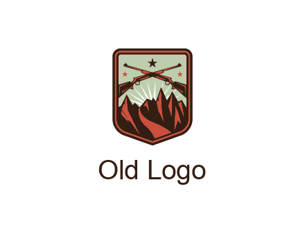 rifles with mountains in badge