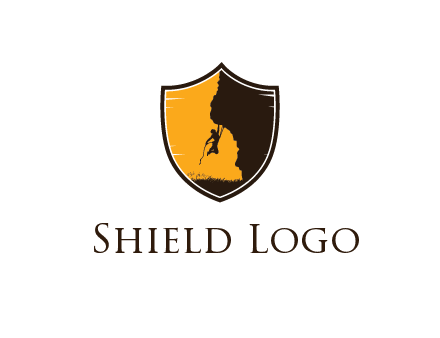 mountain climber hanging off cliff in shield