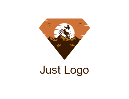 sun behind biker stunting on bike on mountains in diamond