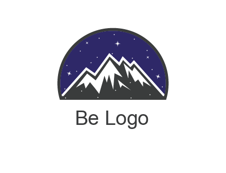 starry sky behind snow caped mountains