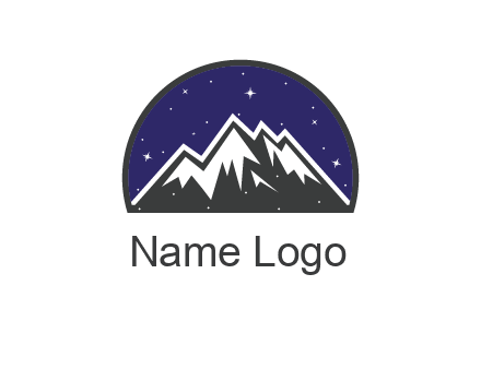 starry sky behind snow caped mountains