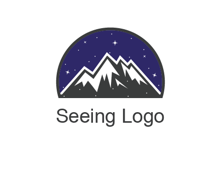 starry sky behind snow caped mountains