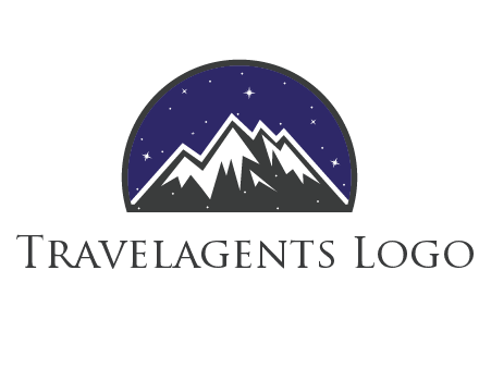 starry sky behind snow caped mountains