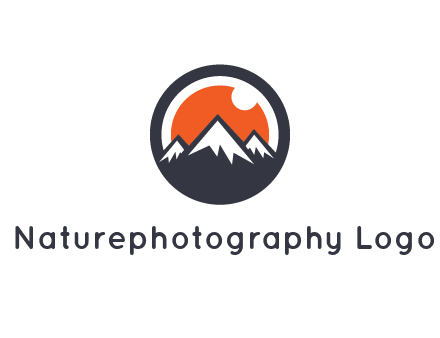 sun as camera lens behind snow caped mountains in circle
