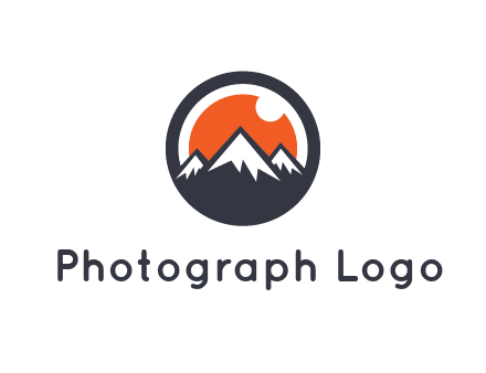 sun as camera lens behind snow caped mountains in circle