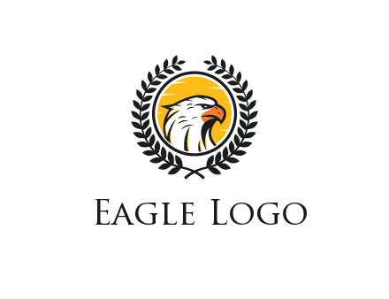 eagle face in circle with leaves