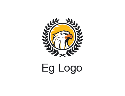 eagle face in circle with leaves