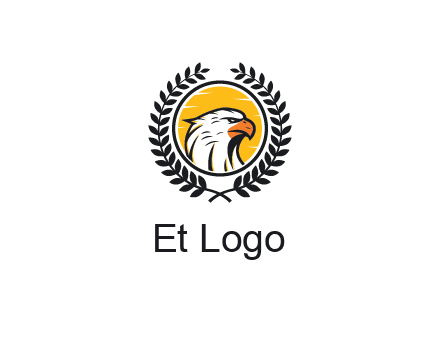 eagle face in circle with leaves