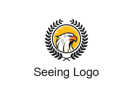 eagle face in circle with leaves