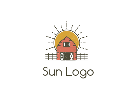 sun behind farmhouse with fence