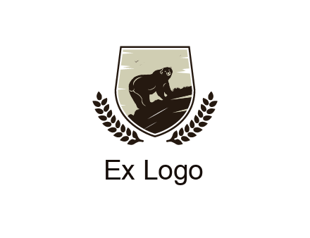 bear climbing hill in shield with leaves