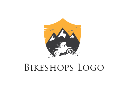negative spacing bike rider in mountains in shield