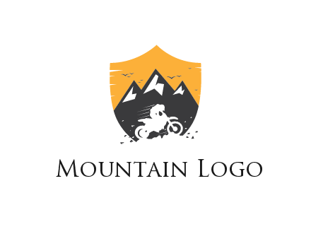 negative spacing bike rider in mountains in shield