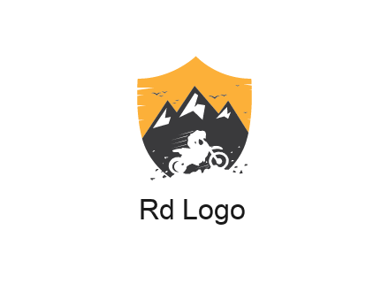 negative spacing bike rider in mountains in shield