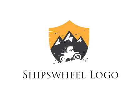 negative spacing bike rider in mountains in shield