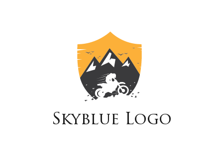 negative spacing bike rider in mountains in shield