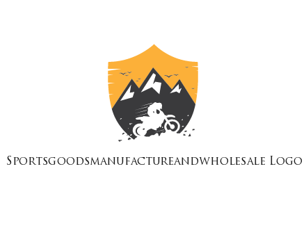 negative spacing bike rider in mountains in shield