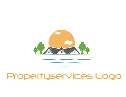 sun behind houses with trees and lake