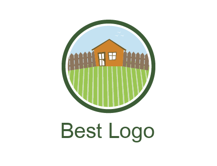 farmhouse with farm and fence in circle frame