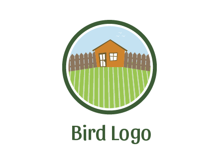 farmhouse with farm and fence in circle frame