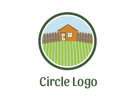 farmhouse with farm and fence in circle frame