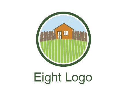 farmhouse with farm and fence in circle frame
