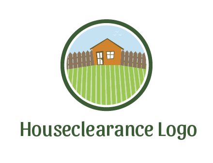 farmhouse with farm and fence in circle frame