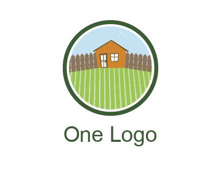 farmhouse with farm and fence in circle frame