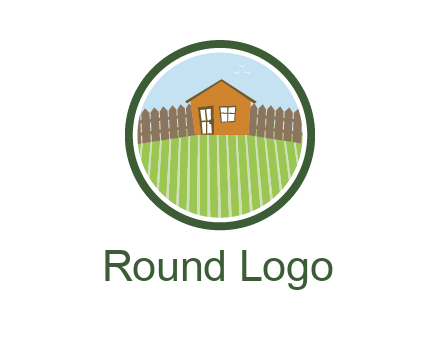 farmhouse with farm and fence in circle frame