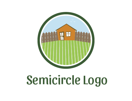 farmhouse with farm and fence in circle frame