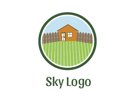 farmhouse with farm and fence in circle frame