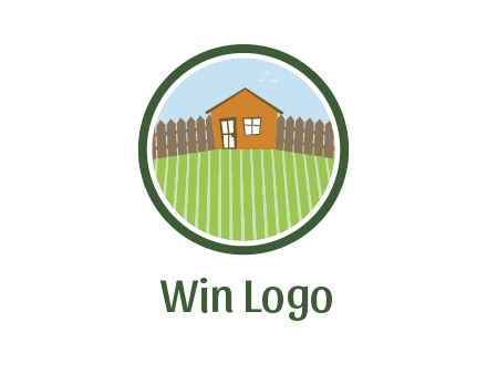 farmhouse with farm and fence in circle frame