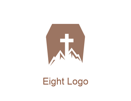 negative spacing mountains and cross in grave