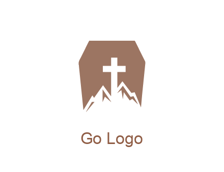 negative spacing mountains and cross in grave