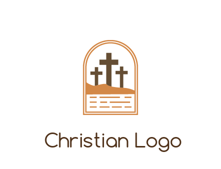 cross in sand in window frame