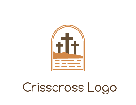 cross in sand in window frame