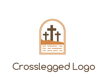cross in sand in window frame
